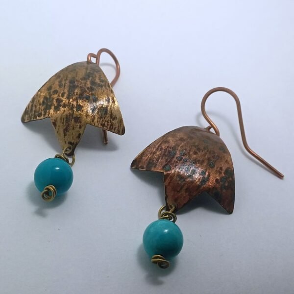 Hammerded copper with blue stone